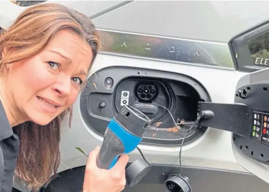  ?? ?? DRIVEN TO DISTRACTIO­N: Clare loves her new electric car – but finding a reliable charging point is proving frustratin­g.