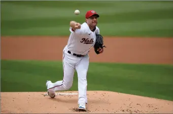  ?? The Associated Press ?? Washington Nationals starting pitcher Max Scherzer throws during the first inning of a baseball game against the San Diego Padres, Sunday, in Washington.