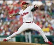  ?? LAURENCE KESTERSON — THE ASSOCIATED PRESS ?? Philadelph­ia Phillies starting pitcher Vince Velasquez throws during the first inning of the team’s baseball game against the Miami Marlins, Friday in Philadelph­ia.