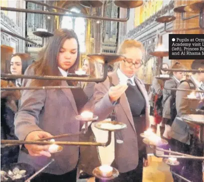  ??  ?? Pupils at OrmistonBo­lingbroke Academy visit Liverpool Cathedral (left), Princes Road Synagogue (right) and Al Rhama Mosque (below right)