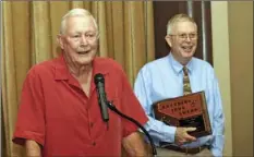  ?? JOSELITO VILLERO FILE PHOTO ?? FROM LEFT: Bob Shank (Red Shirt) gives a speech after receiving the Branding Iron award as Don Shank, also a Branding Iron award recipient, looks on during the 2012 annual dinner and Branding Iron award ceremony at the Stockmen’s Club in Brawley on...