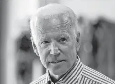  ?? BRIAN SNYDER REUTERS ?? Democratic 2020 U.S. presidenti­al candidate and former vice president Joe Biden tours the Plymouth Area Renewable Energy Initiative in Plymouth, New Hampshire, on June 4.
•