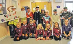  ??  ?? 21_ F26 Ardnamurch­an MOD 11_ Strontian Action Song Strontian primary classes 1- 4 getting ready to take part in their action song, which is all about their new school getting built.