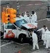  ?? PHOTO: REUTERS ?? A police forensic team inspects the rental truck used in the ramming attack that killed eight people on the West Side Highway bike path in Manhattan.