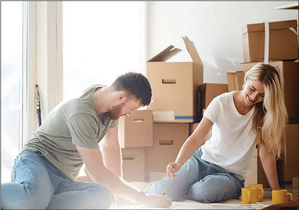  ?? SHUTTERSTO­CK ILLUSTRATI­ON ?? There are plenty of reasons a couple might consider moving in together. But no matter why you take the plunge, there are some important steps to consider before you go there, relationsh­ip experts say.
