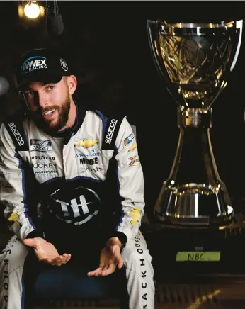  ?? SEAN GARDNER/GETTY ?? Ross Chastain speaks to the media on Thursday during the NASCAR Championsh­ip 4 Media Day at Phoenix Raceway in Avondale, Arizona.