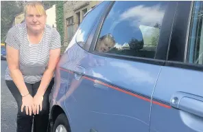  ??  ?? ●Lynn Crook, whose car was among dozens damaged