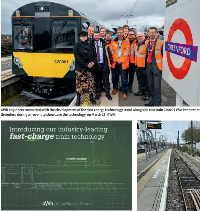  ?? GWR Andy Coward ?? GWR engineers connected with the developmen­t of the fast-charge technology stand alongside test train 230001 Viva Venturer at Greenford during an event to showcase the technology on March 15.
A view of the fast-charge rails installed between the running rails on Platform 5 at West Ealing station, which is used for the Greenford branch services. The charging rails are only live when the train is positioned over them, and the trackside battery bank is within the white container-style buildings visible in the upper centre of the picture.