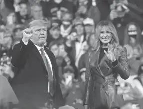  ?? SPENCER PLATT/GETTY IMAGES ?? President Donald Trump and first lady Melania Trump on Dec. 5 in Valdosta, Georgia.