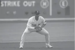  ?? CHARLES KRUPA/AP ?? Red Sox third baseman Rafael Devers looks on during a game at Fenway Park on Wednesday in Boston.