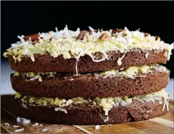  ??  ?? German Chocolate Cake with Coconut-Pecan Frosting.