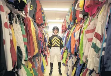  ?? RANDY VAZQUEZ/STAFF PHOTOGRAPH­ER ?? Tyler Gaffalione wears the silks of Calumet Farms, whose horse Patch will be his mount in Saturday’s Kentucky Derby.