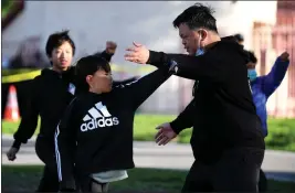  ?? PHOTOS BY AXEL KOESTER ?? Kevin Leung, head instructor of Siu Lum Pai Kung Fu Associatio­n, says students need to keep practicing to feel a sense of “normalcy.”