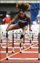  ?? Associated Press ?? World-record holder Keni Harrison won her first U.S. outdoor track and field championsh­ip by taking first in the 100-meter hurdles on Saturday in Sacramento.