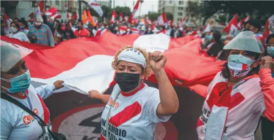  ?? / AFP ?? El proceso electoral que vivieron los peruanos ha sido uno de los más complejos y polarizant­es de su historia.