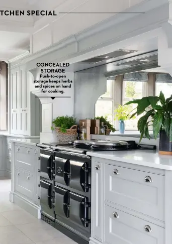  ?? ?? RIGHT ‘I’d had an Aga before and this new model has a timer, so it’s more controllab­le and flexible than my previous one – and there’s a separate induction hob, too.’
Anthracite ER7 Pewter electric Aga, £15,000, Whites Aga
CONCEALED STORAGE
Push-to-open storage keeps herbs and spices on hand for cooking.