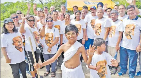  ?? Picture: JONACANI LALAKOBAU ?? Aarush Ahalawat, 11, with other participan­ts during Mahatma Gandhi’s 150th birth anniversar­y walkathon and India Fiji Friendship Forum at My Suva Picnic Park on Sunday.