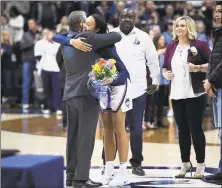  ?? Jessica Hill / Associated Press ?? UConn senior Napheesa Collier embraces coach Geno Auriemma during senior day before a game against Houston on Saturday in Storrs.