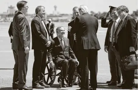  ?? Smiley N. Pool / Dallas Morning News ?? From left, Lt. Gov. Dan Patrick, Attorney General Ken Paxton and Gov. Greg Abbott greet President Donald Trump in Dallas in June.