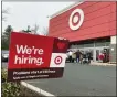  ?? TED SHAFFREY — THE ASSOCIATED PRESS ?? Target says it will adopt minimum wages that range from $15 to $24 an hour, with the highest pay going to hires in the most competitiv­e markets.