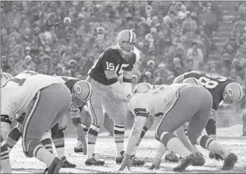  ??  ?? In this Dec. 31, 1967, file photo, Green Bay Packers quarterbac­k Bart Starr calls signals in bitter cold as he led the Packers to a win over the Dallas Cowboys in Green Bay, Wisc. AP PHOTO