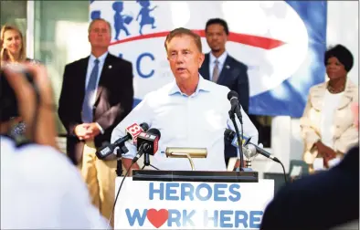  ?? Christian Abraham / Hearst Connecticu­t Media ?? Gov. Ned Lamont speaks to the media during a visit to Children's Learning Center in Stamford on Tuesday. Lamont held the news conference to discuss the importance of investing in early childhood and highlighte­d the center’s work to address education, public and mental health disparitie­s, especially during the pandemic. CLC received $1.4M. from the state.