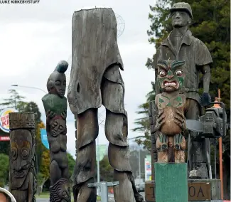  ??  ?? LUKE KIRKEBY/STUFF
Tokoroa’s Talking Pole forest along State Highway 1 is symbolic of the town’s many cultures coming together. Inset: Race Relations Commission­er Meng Foon has praised Tokoroa’s approach to celebratin­g cultural diversity.