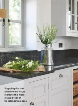  ??  ?? Stepping the sink unit forward helps recreate the more relaxed feel of freestandi­ng pieces.