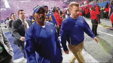  ?? BOB ANDRES / BANDRES@AJC.COM ?? Los Angeles Rams head coach Sean McVay (right) walks off Sunday after Super Bowl LIII in Atlanta, Ga. “The thing that is so tough about all of this is the finality to it,” he said.