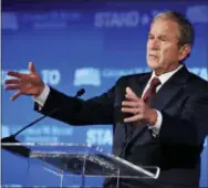  ?? JACQUELYN MARTIN—THE ASSOCIATED PRESS ?? In this June 23, 2017 file photo, former President George W. Bush speaks during “Stand-To,” a summit held by the George W. Bush Institute focused on veteran transition, in Washington. Bush will be in Florida on Friday to fundraise for Gov. Rick Scott’s bid to oust Democratic Sen. Bill Nelson in a closely watched and expensive campaign.