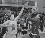  ?? Steve Galluzzo For The Times ?? EMMA PEREZ of Granada Hills, left, blocks a shot by Westcheste­r’s Ron’yae Jackson in the second half.