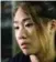  ??  ?? Vancouver-born Angela Lee may not be able to defend her One Championsh­ip world atomweight belt.