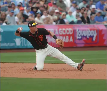  ?? JOHN MEDINA — FOR THE BAY AREA NEWS GROUP ?? Giants third baseman Shane Matheny (89) makes a difficult play during a spring training game against the Royals at Scottsdale Stadium on Sunday in Scottsdale, Arizona.