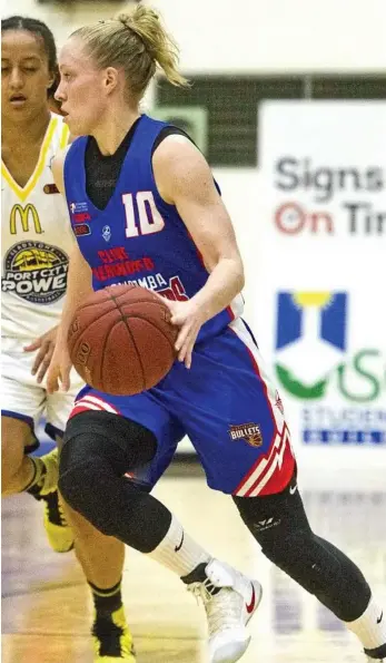 ?? PHOTO: NEV MADSEN ?? A WIN AT LAST: Mountainee­rs women’s import Francis Donders of the Netherland­s dribbles against Gladstone Port City Power.