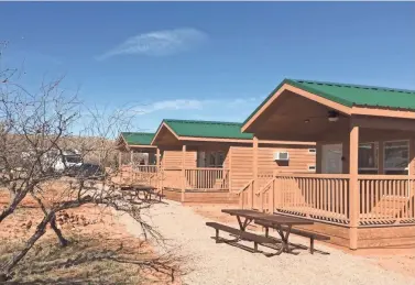  ?? SCOTT CRAVEN/THE REPUBLIC ?? The cabins share space in the Kartchner Caverns State Park campground, just across the street from the bathroom facilities.