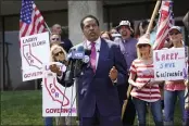  ?? MARCIO JOSE SANCHEZ — THE ASSOCIATED PRESS FILE ?? Larry Elder speaks to supporters during a campaign stop in Norwalk. Elder, in his first press conference since announcing his candidacy July 12, told reporters that if he replaces Democratic Gov. Gavin Newsom in the Sept. 14 election any mask or vaccine mandates in place at that time “will be suspended right away.”