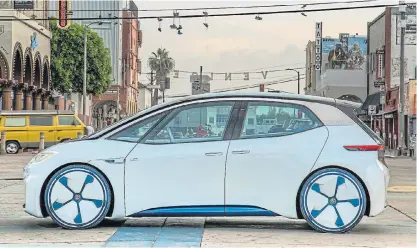  ??  ?? The ID will spearhead VW’s electric-car drive when it is launched next year. Below left: VW CEO Herbert Diess is taking a risky bet with plans to raise annual production of electric cars to 3-million by 2025, from 40,000 last year.