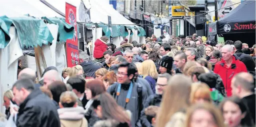  ??  ?? Thousands of people crowd into Ramsbottom town centre for the annual chocolate festival, but safety fears which threatened the immensely popular event have now been ironed out – allowing it to go ahead this year on April 8 and 9 as planned