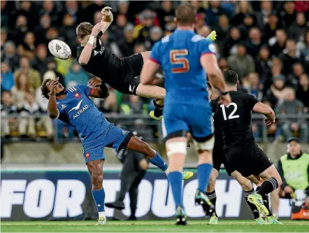  ??  ?? Beauden Barrett tumbles towards the ground after the mid-air collision that resulted in a contentiou­s red card to French fullback Benjamin Fall during the second test in Wellington. GETTY IMAGES
