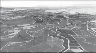  ?? Courtesy photo
/ Calmatters ?? Aerial view of Sacramento River and San Joaquin River Delta.