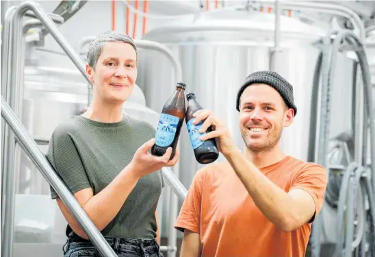  ?? Photo / Warren Buckland ?? Brave Brewing owners Gemma and Matt Smith with their Bottle Rocket EPA which made the top 30 in the New World Beer and Cider Award.