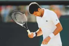  ?? Reuters ?? Novak Djokovic reacts as he retires from his quarter-final match against Tomas Berdych with an injury.