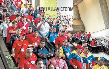  ?? / REUTERS ?? Apoyo. En el congreso partidario, los delegados “socialista­s” avalaron el anuncio del ajuste.