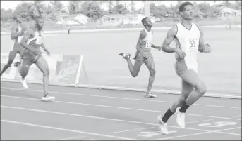  ?? Charles photo) (Orlando ?? Daniel Wilson wins the men’s 400m event from Samuel Lynch.