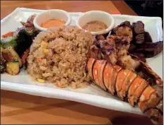  ?? Arkansas Democrat-Gazette/ERIC E. HARRISON ?? The lobster and filet mignon hibachi entree comes with fried rice and grilled vegetables at Ninja Bar, Sushi & Grill on Cantrell Road.