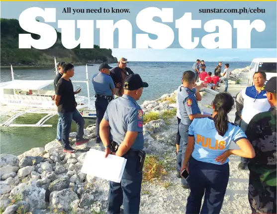  ?? SUNSTAR FOTO / ALLAN CUIZON ?? PORT. A police team inspects the port in Daanbantay­an town where Mayor Vicente Loot survived an ambush attempt on Sunday morning.