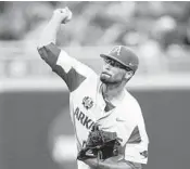  ?? NATI HARNIK/AP ?? Arkansas pitcher Isaiah Campbell works against Florida the fifth inning of Friday’s game in Omaha, Neb. in