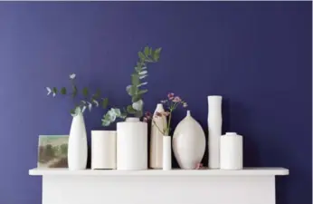  ??  ?? Colour experts say dark blues will be hot in 2013, especially shades such as “Inspired Violet” by Dulux.