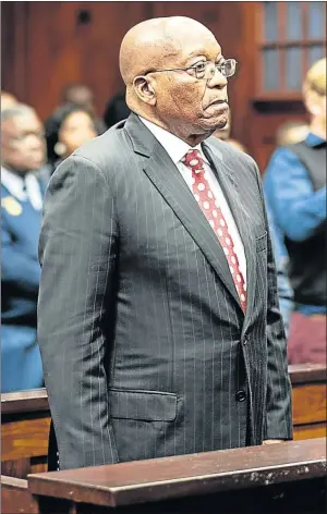  ?? Picture: AFP ?? D-DAY: Former president Jacob Zuma in the dock yesterday at the Durban Magistrate’s Court