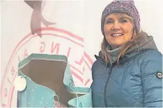  ?? ?? C’mon the Reds Observer reporter Kaiya Marjoriban­ks manned the drop-off point at Stirling Albion’s Forthbank stadium during the Binos Christmas Bonanza
